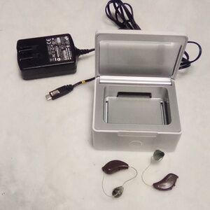 ReSound hearing aids with hearing aid dehumidifier